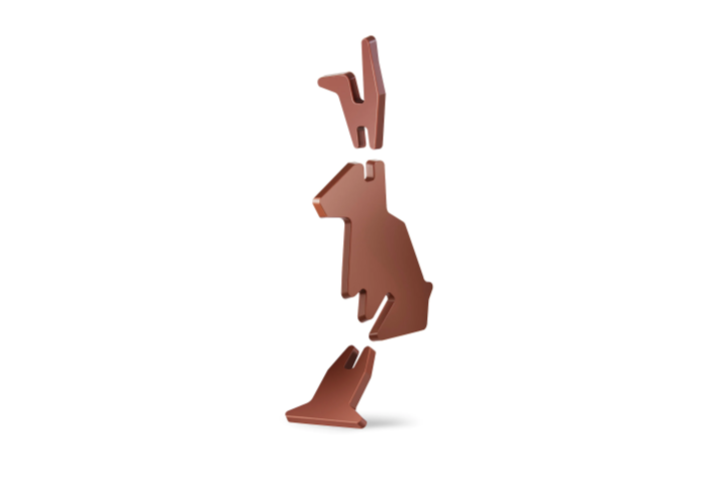 Chocolate bunny being assembled.