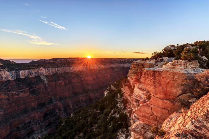 The sun sets over the Grand Canyon at Bright Angel Point.