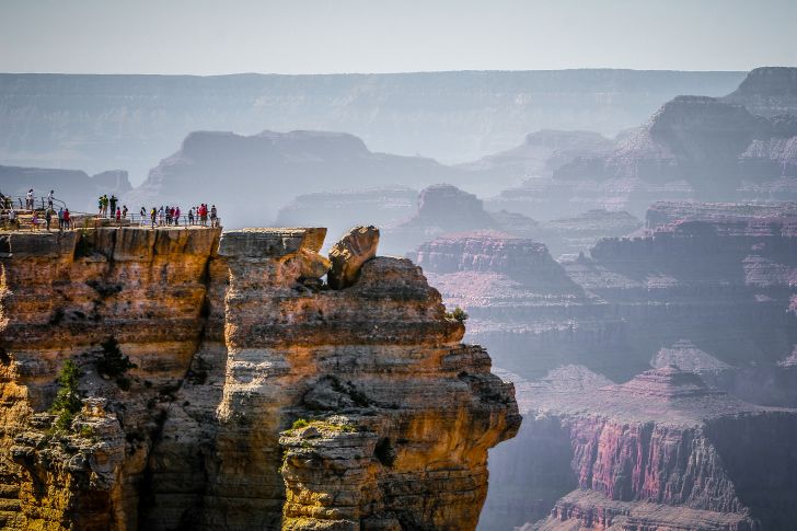 Tourists stand at Mather Point