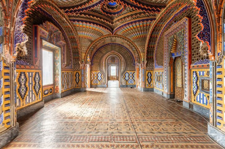 A room in Sammezzano Castle with arched ceilings and intricate tile work