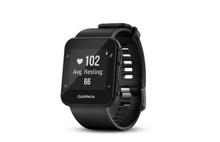 A Garmin Forerunner 35 smart watch displays its heart rate monitoring feature