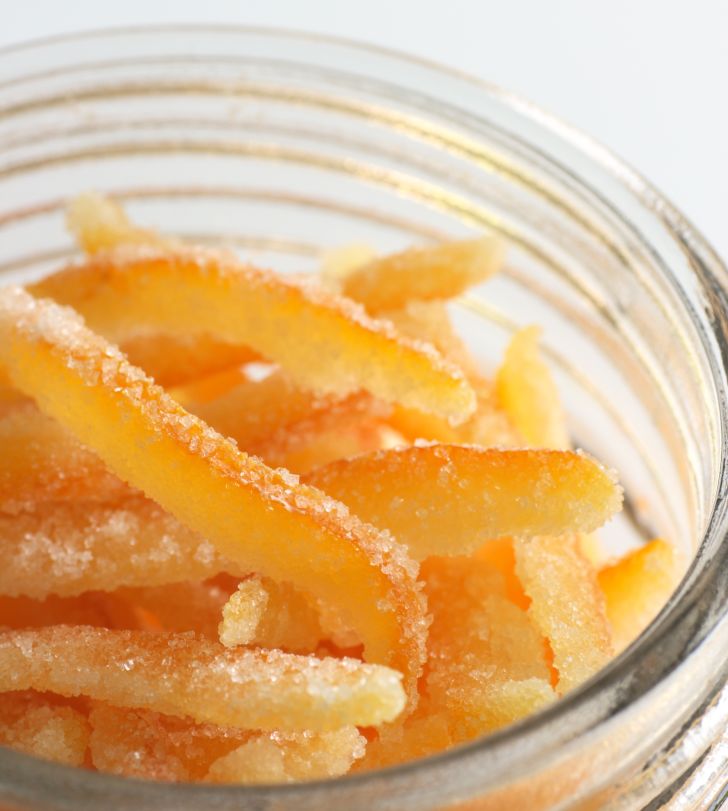 Candied orange peel in jar.