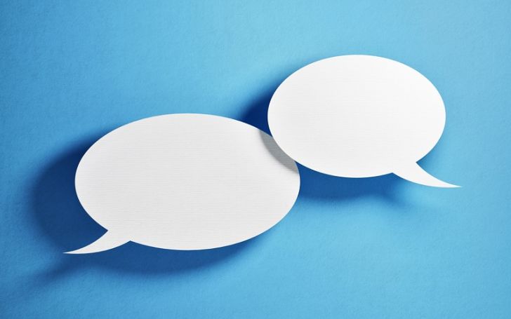 Two word balloons represent the concept of social networking