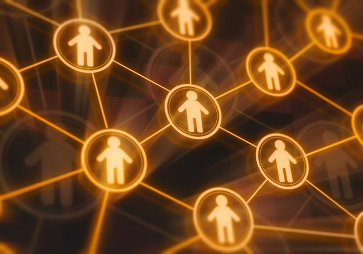 Human-shaped icons represent the concept of social networking