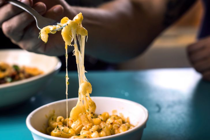 Cheesy mac and cheese in a bowl.