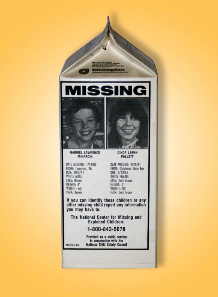 A milk carton displays photos of missing children.