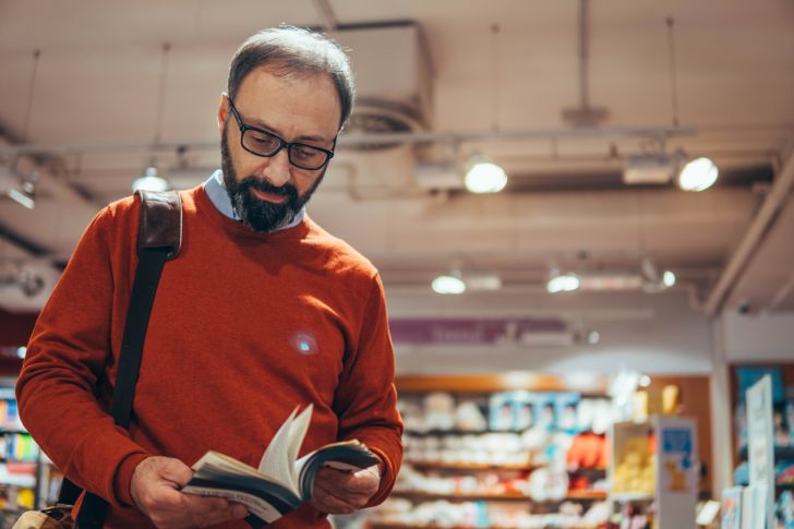 A red sign advertising bestsellers at a bookstore