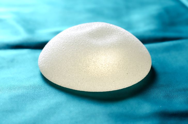 silicone breast implant on blue cloth