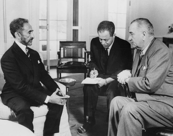 American President Lyndon Baines Johnson addresses the nation on his first thanksgiving day television programme, broadcast from the executive offices of the White House