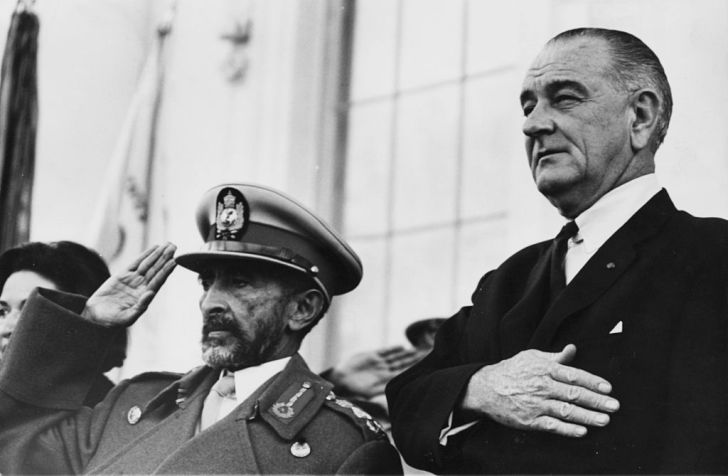 Emperor Haile Selassie saluting and US President Lyndon B Johnson holding his hand to his heart as the National Anthems are played, at the White House in Washington DC, February 18th 1967