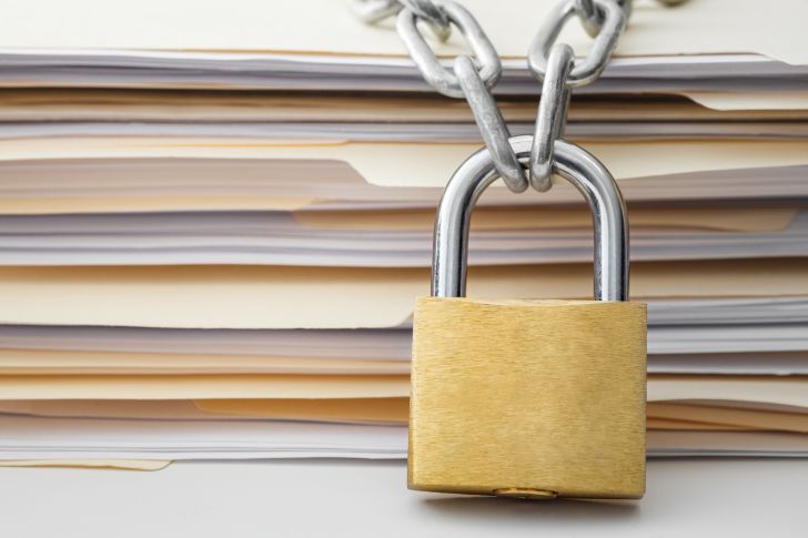 image of file folders with a lock over them