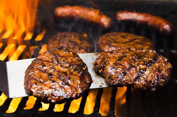 image of hamburger patties on a grill
