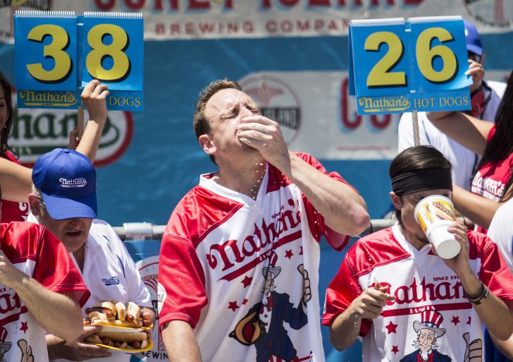 Image of competitors at the Nathan's Famous hot dog eating competition in 2017 (I think)