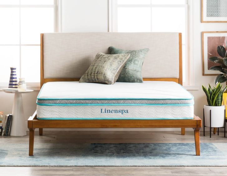 A bare mattress from Linenspa in a bedroom