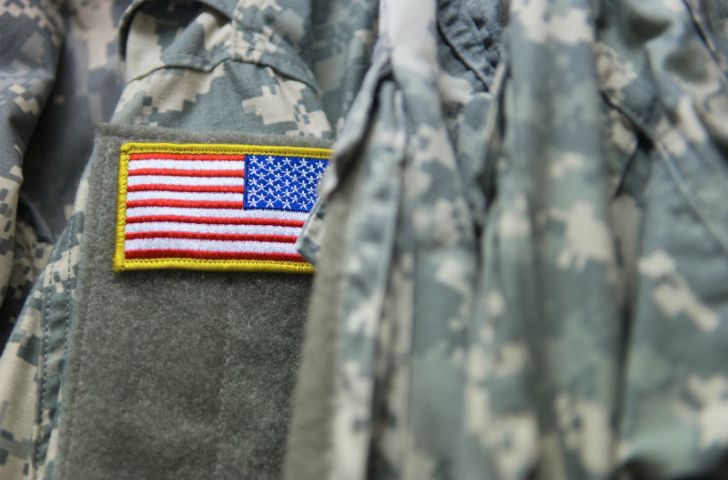 The American flag appears on a military uniform