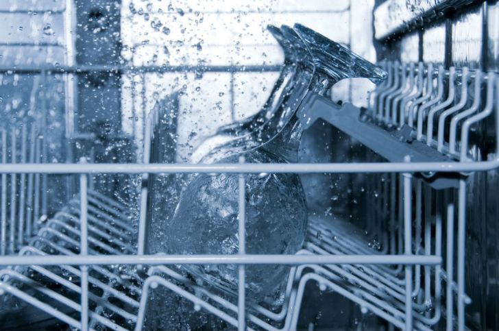 Glasses are washed inside a dishwasher