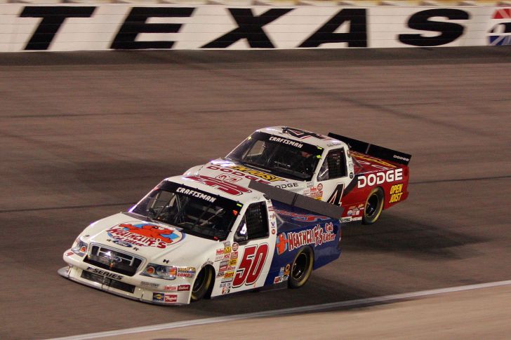 T.J. Bell, driver of the #50 Heathcliff's Cat Litter Ford leads Joe Ruttman, driver of the #4 Open Joist Dodge during the Sam's Town 400 at Texas Motor Speedway June 8, 2007 in Fort Worth, Texas