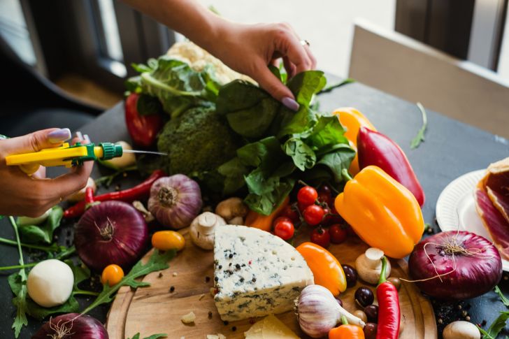 Food stylist preparing vegetables
