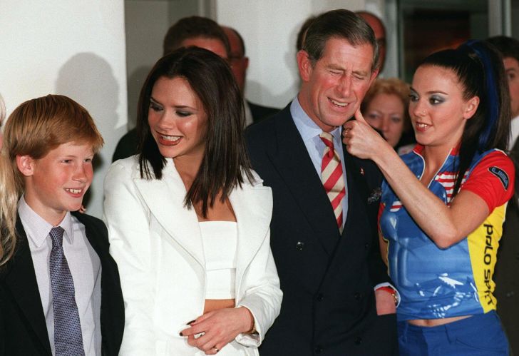 Prince Charles and Prince Harry pose with Spice Girls Victoria Beckham Mel C