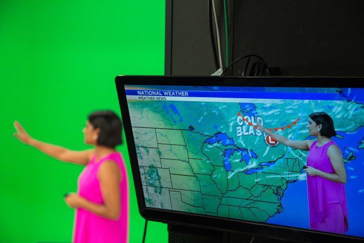 A view of a meteorologist as seen on-screen and in the studio against a green screen