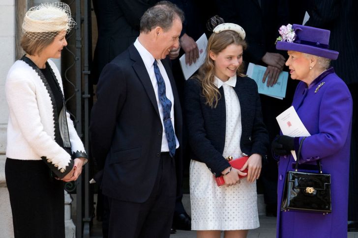 Britain's Queen Elizabeth II (R) speaks to Serena Armstrong-Jones, Countess of Snowdon (L), David Armstrong-Jones (2L), 2nd Earl of Snowdon, and Lady Margarita Armstrong-Jones (2R).