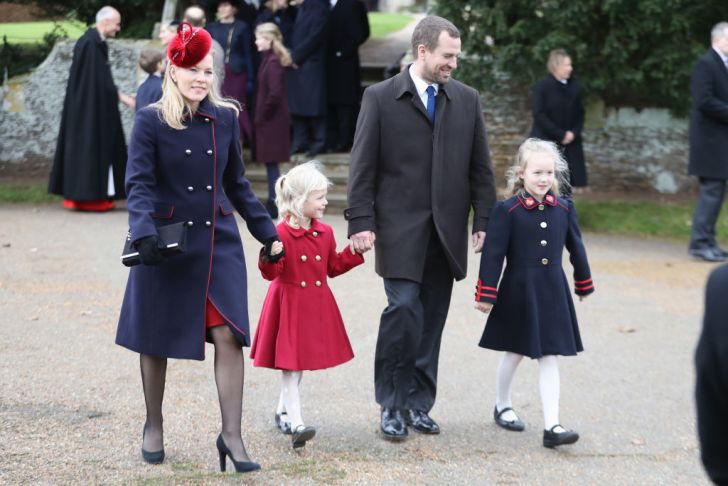 Autumn Phillips, Isla Phillips, Peter Philips and Savannah Phillips attend Christmas Day Church service at Church of St Mary Magdalene on December 25, 2017 in King's Lynn, England