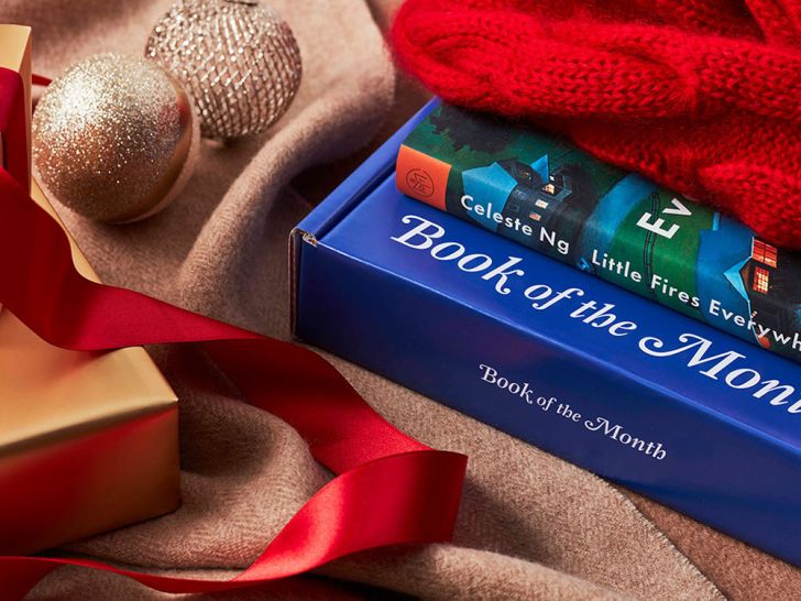 A book of the month club subscription box A book of the month club subscription box with gift trappings nearby