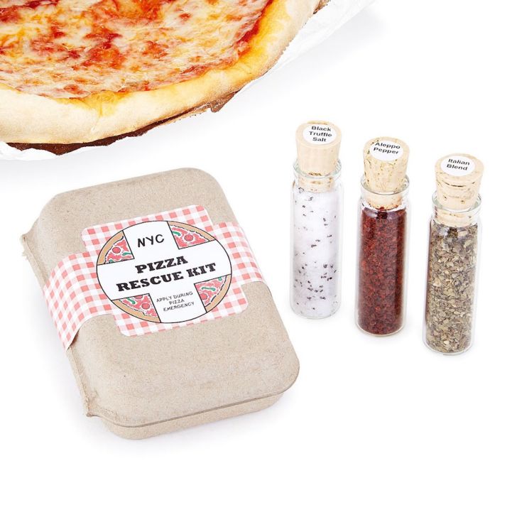 Vials of spices next to a box.
