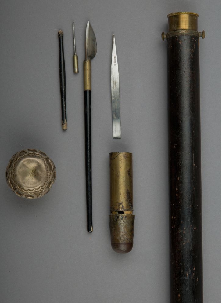 Cane with hidden microscope.