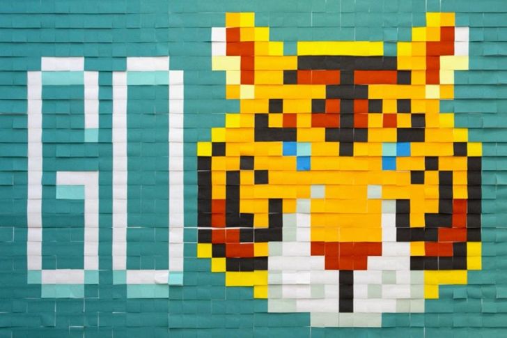 Post-It note mural of sports team.