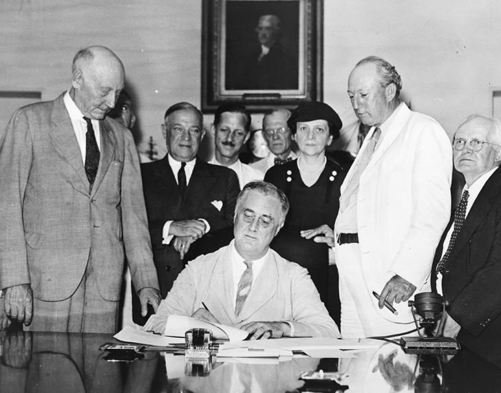 President Roosevelt signing the Social Security Act