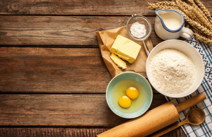 Dough recipe ingredients on vintage rural wood kitchen table Dough recipe ingredients on vintage rural wood kitchen table