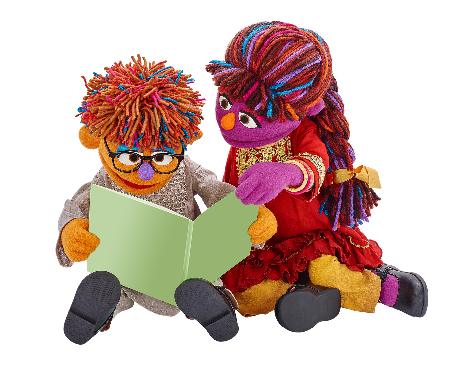 Zeerak sits with his older sister Zari. They're reading together.