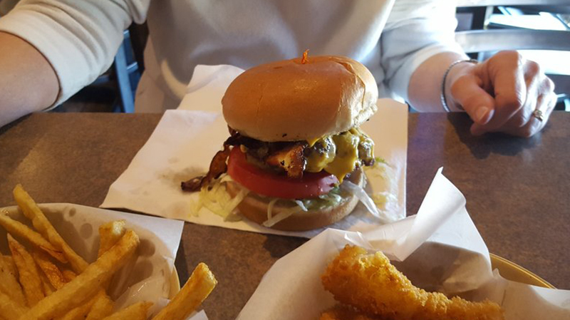 burger on a table at stellas diner