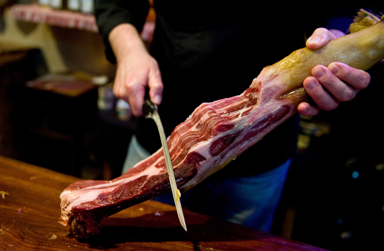 slice of dry-cured Jamon Iberico de bellota